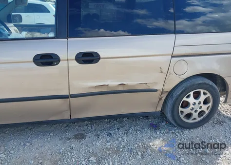 1999 Honda Odyssey Lx z USA, uszkodzony, nr VIN 2HKRL1852XH545232